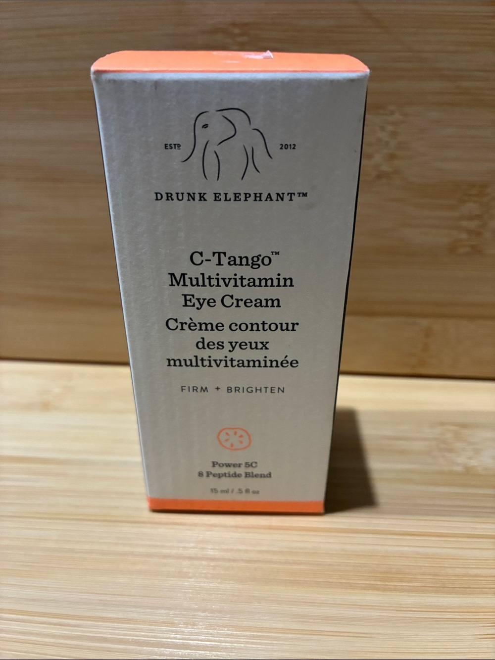 Drunk Elephant C-Tango Eye Cream in Peach and Cream Packaging
